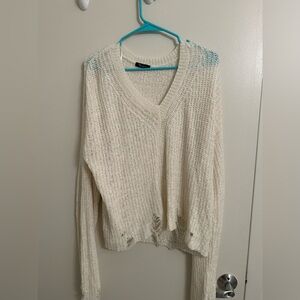 Distressed sweater